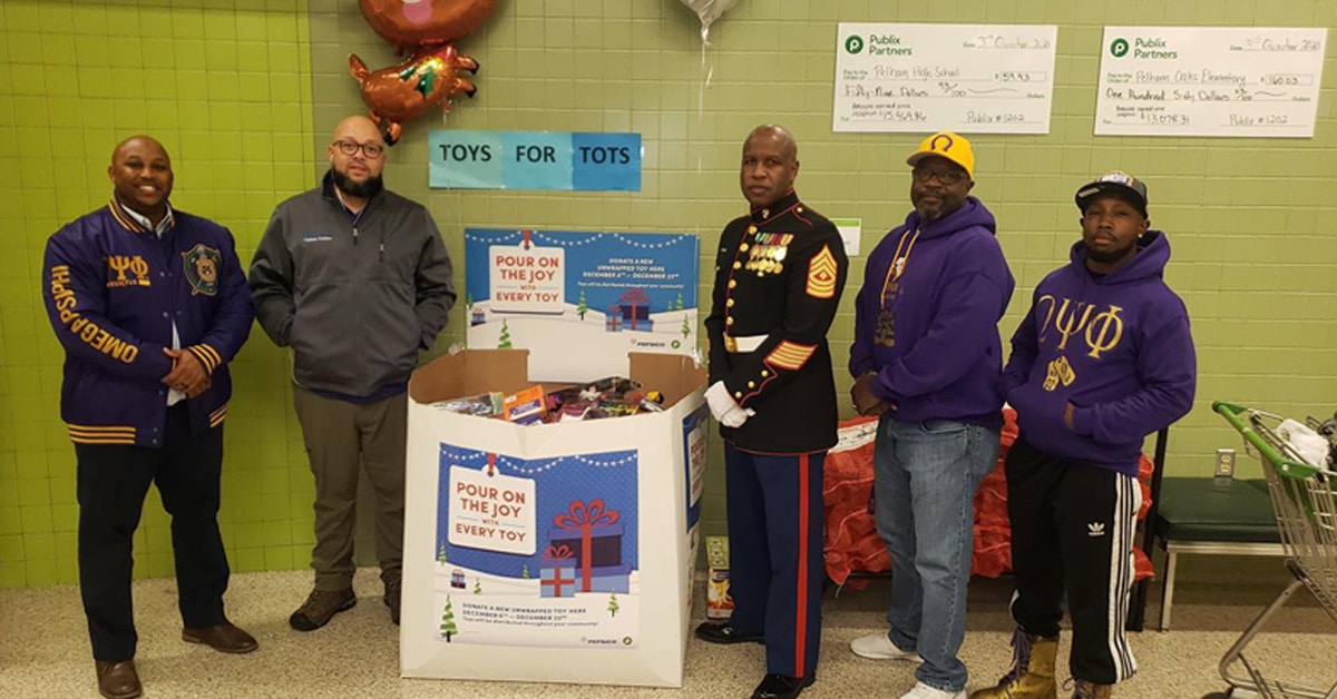 a group of people standing in a room